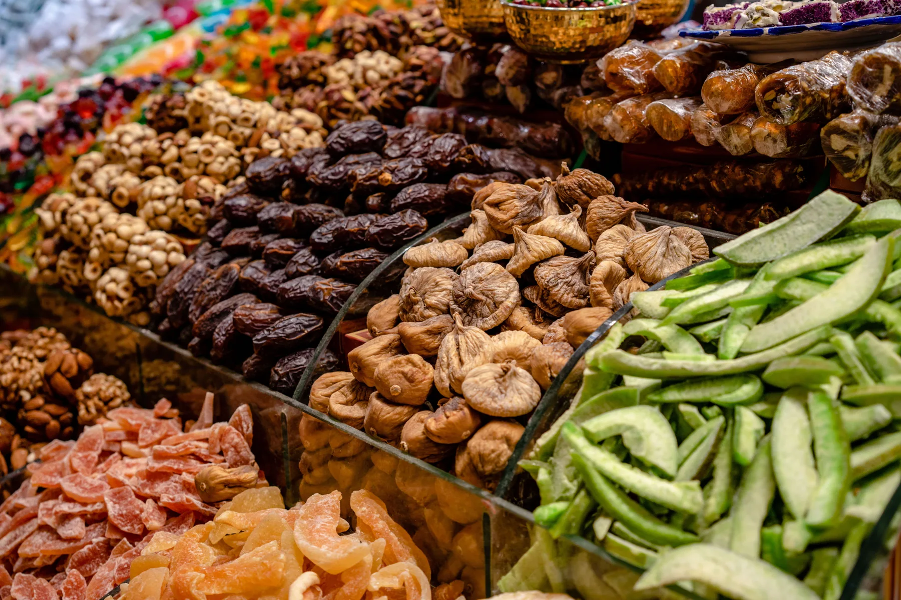 Representative display of assorted dried fruits at a market